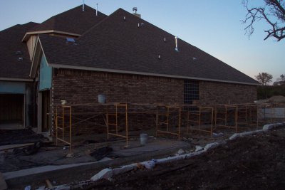 Side of the house with brick