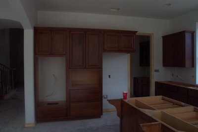 Kitchen cabinets (oven side)