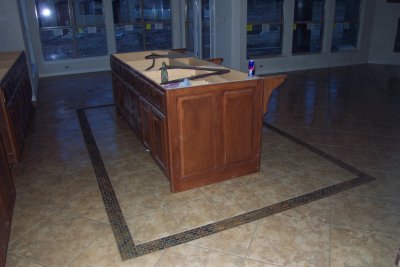 The kitchen island with tile border