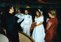 [ A picture of the ceremony - from right to left:
    OPHarbour (Best Man), Jeff, Julie, Katrina (Matron of Honor) ]